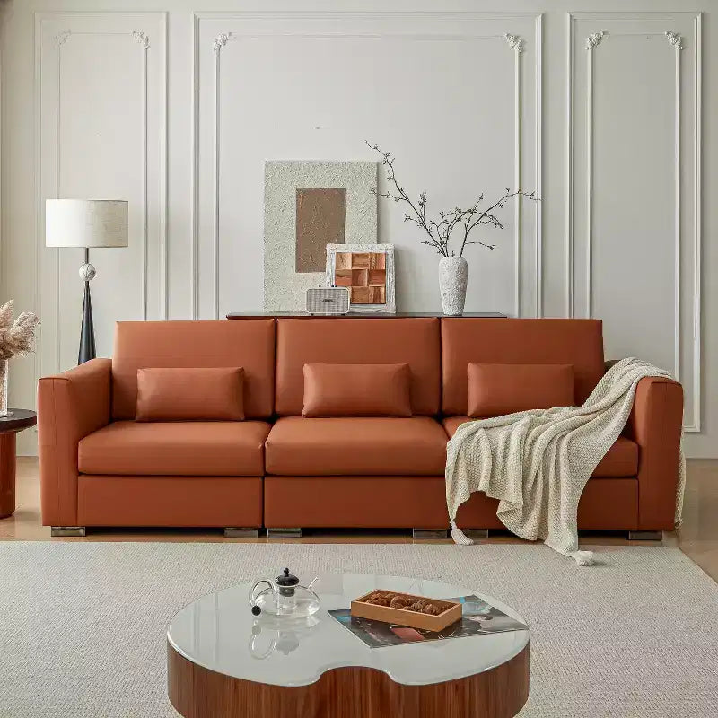 Divano componibile in pelle Mid-Century Modern – Vera pelle arancione, gambe in metallo, 2 cuscini, seduta profonda