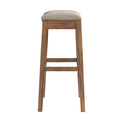 Sgabello alto da bar Williston imbottito – Struttura in legno di gomma, rifiniture con borchie, 136 kg