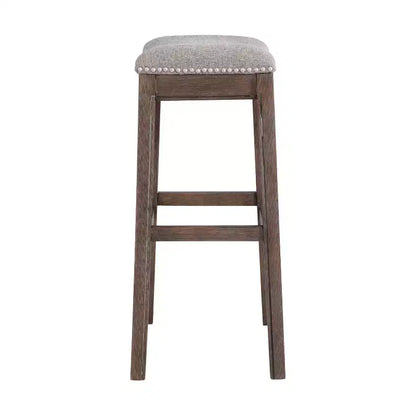 Sgabello alto da bar Williston imbottito – Struttura in legno di gomma, rifiniture con borchie, 136 kg